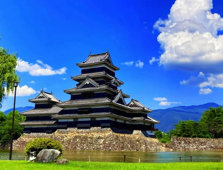 Side view of Matsumoto Castle showing the connected tower structures